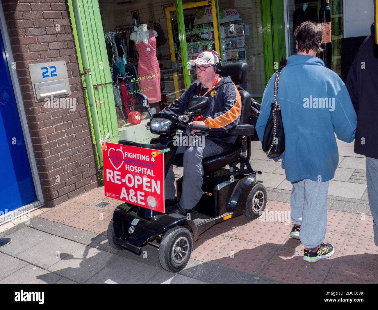 A campaign placard on the front of a mobility scooter. Grantham