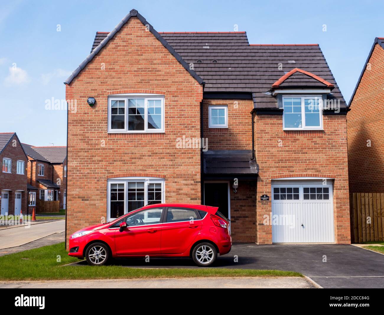 A newly built and sold house, part of a development by Bellway Homes