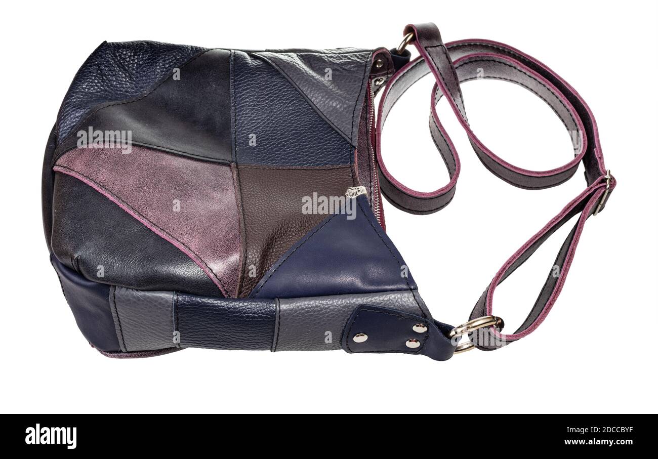 handcrafted patchwork leather crossbody bag isolated on white background Stock Photo