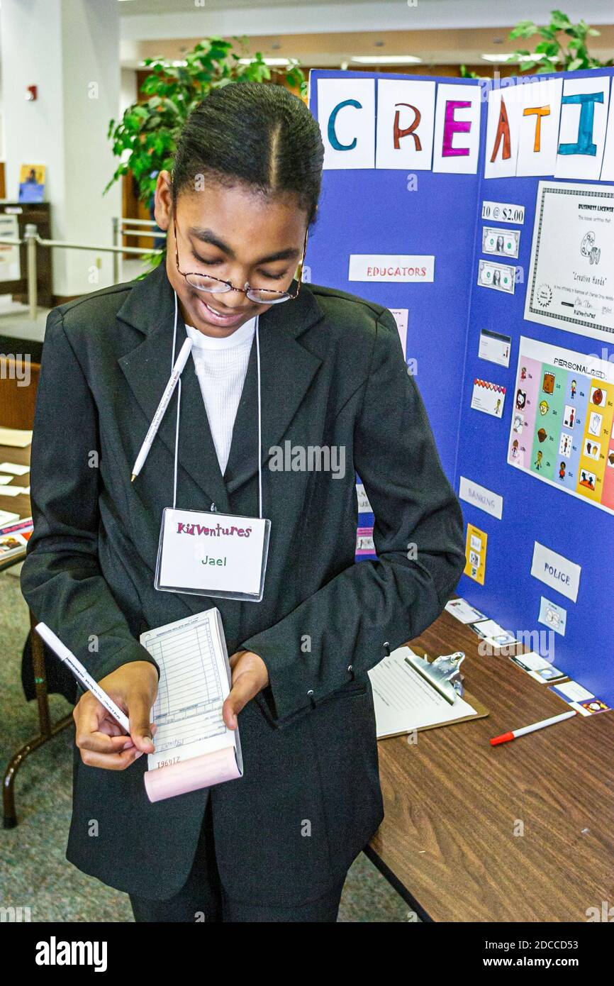 Miami Florida,KidVentures Expo learning entrepreneurs,student students presenting business ideas Black African girl, Stock Photo