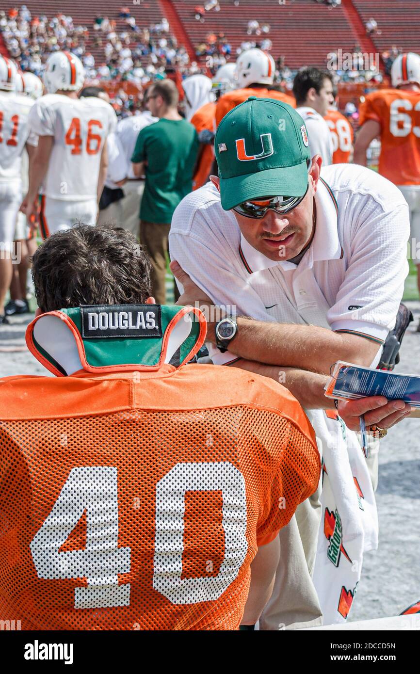 Miami Florida,Orange Bowl University of Miami Hurricanes Canesfest,college football preseason scrimmage fans stadium players coach, Stock Photo