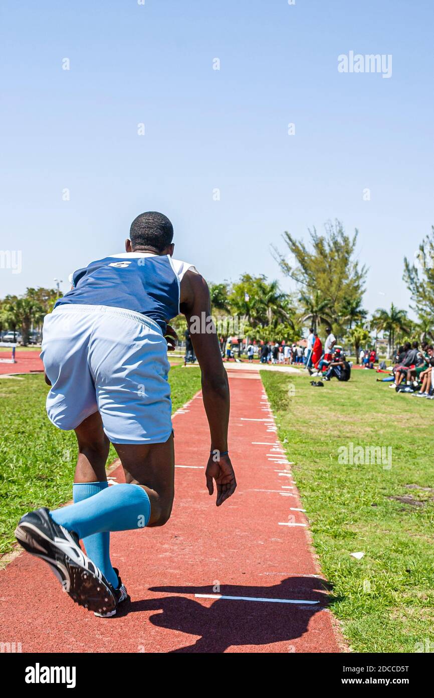 Miami Florida,Tropical Park Greater Miami Athletic Conference championships,track & field high school student students competitors competing,teen teen Stock Photo