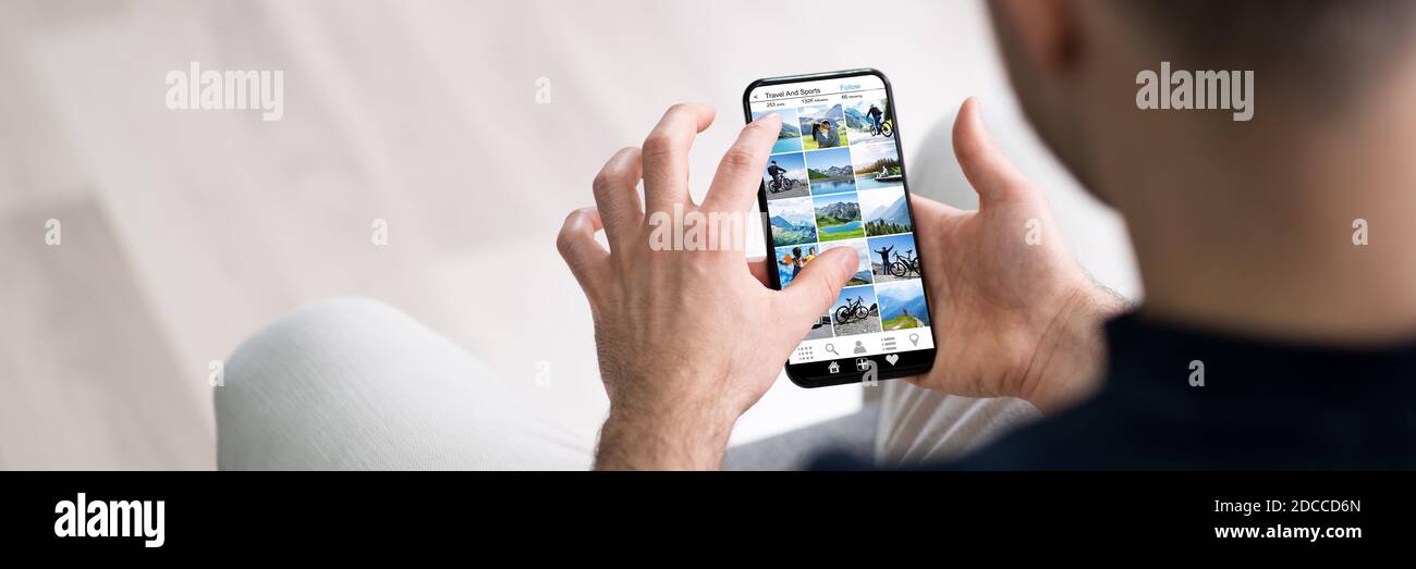 Happy female hold phone chat in social network read good news, shopping via  online store app at home Stock Photo by StudioVK