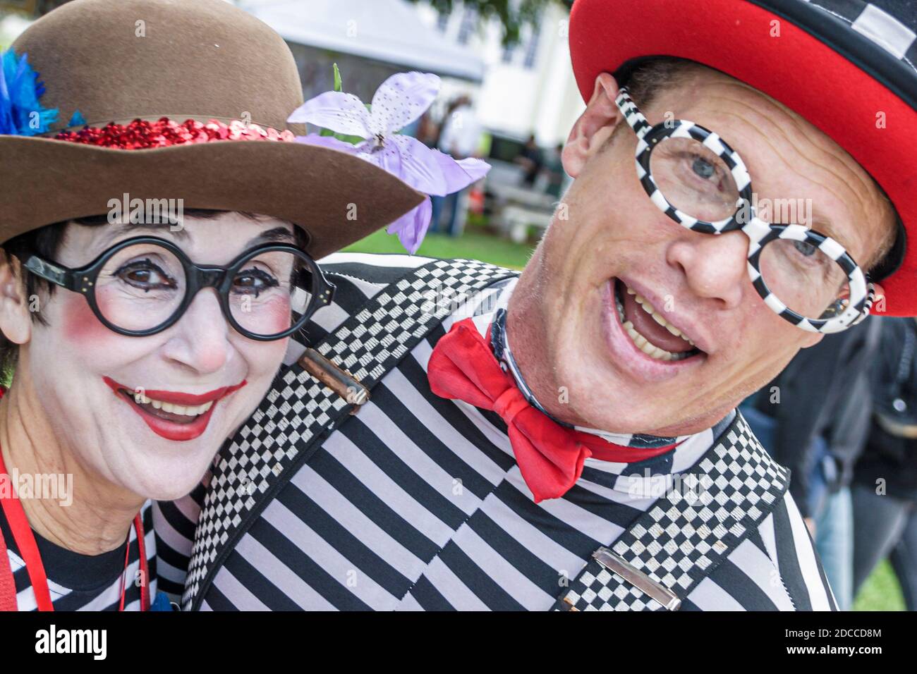 Miami Florida,Coral Gables Merrick Festival,fair Art in the Tropics clowns man woman female couple, Stock Photo