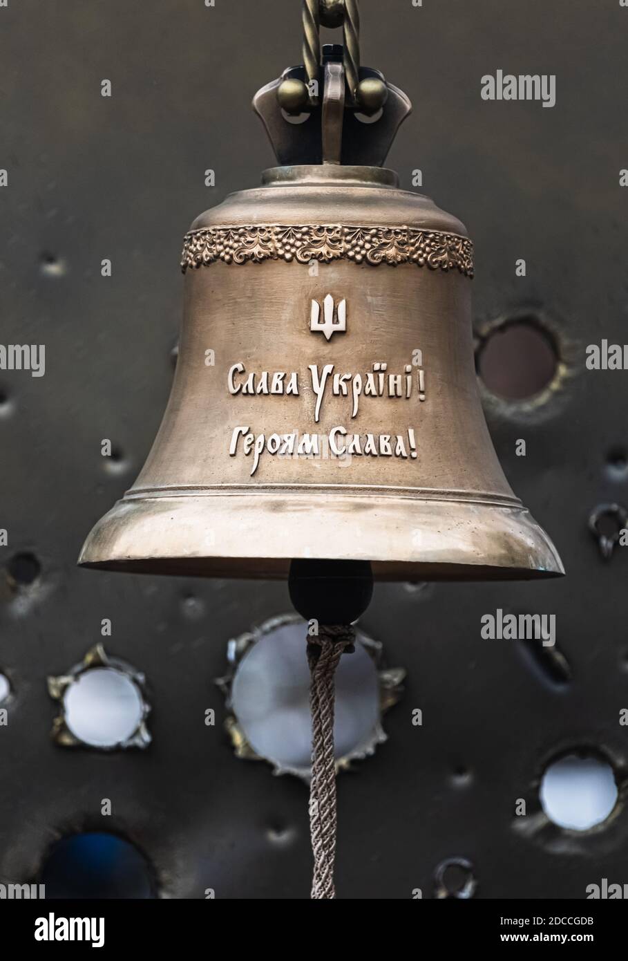 KYIV, UKRAINE - Dec. 06, 2018: Memory bell in the Ministry of Defense of Ukraine. Words on the bell - Glory to Ukraine! Glory to heroes! Stock Photo