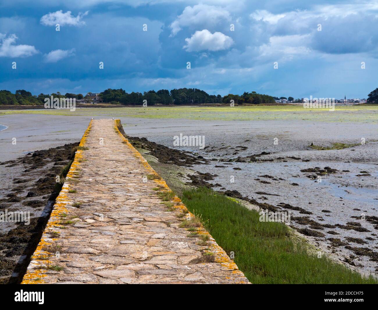 Causeway on the estuary of the Pont L'Abbe river in Finistere Brittany north west France. Stock Photo