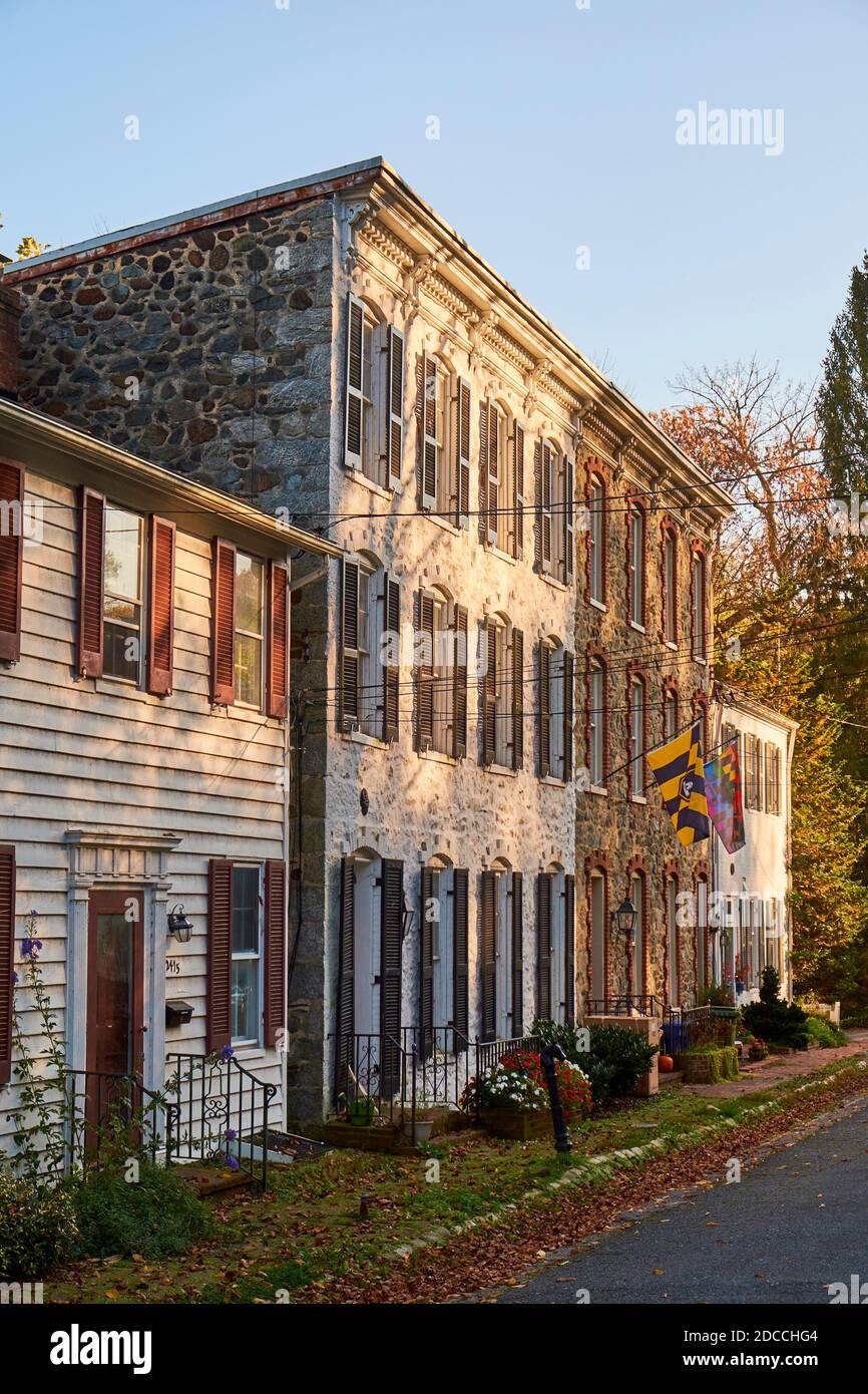 Rowhouses on a typical street in Dickeyville, the Colonial-era, historic mill town. In Baltimore, Maryland during autumn. Stock Photo