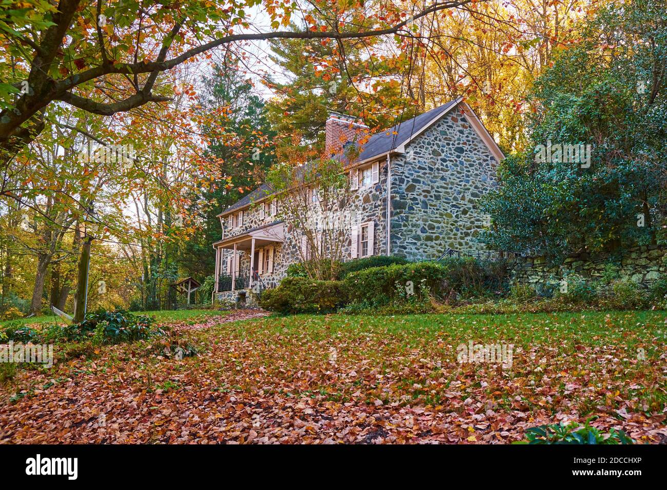 An old stone house on a street in Dickeyville, the Colonialera