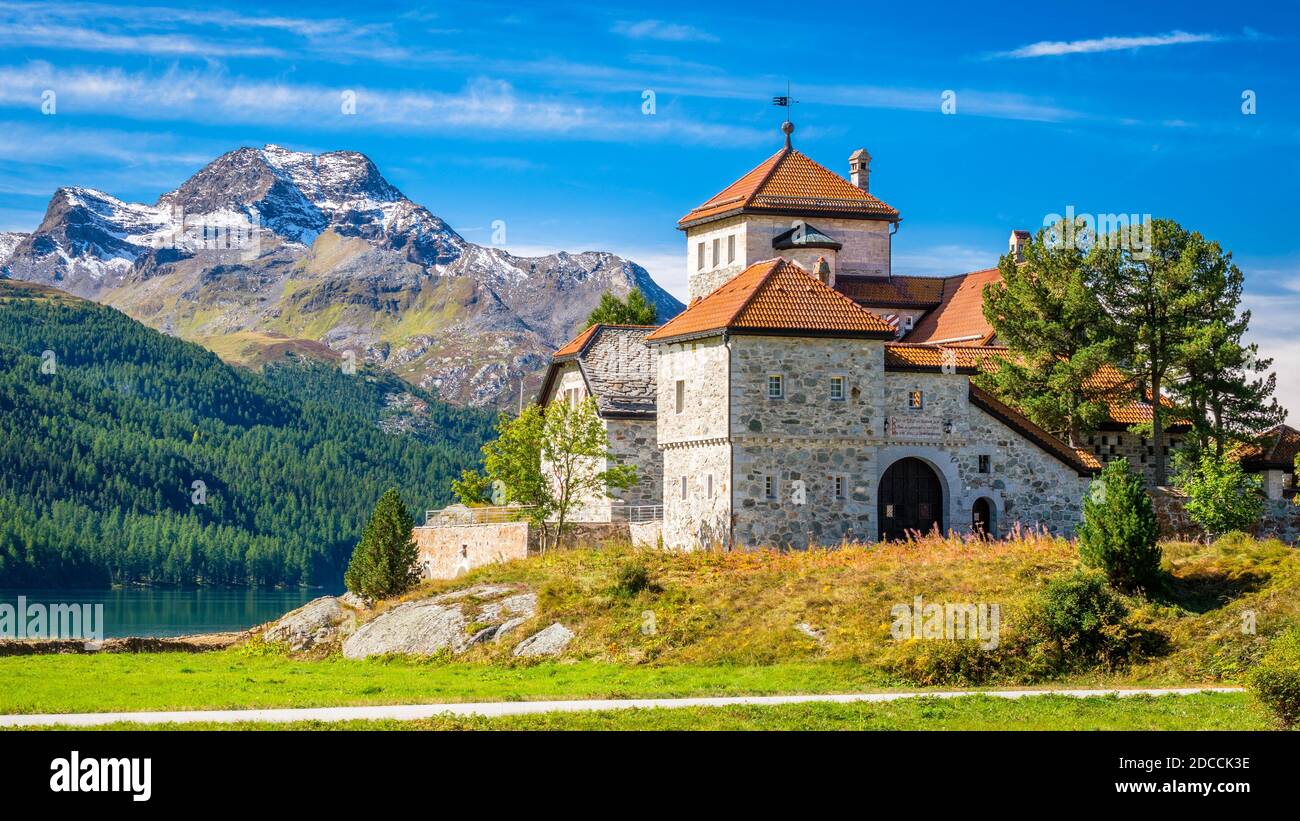 Lake Silvaplana, Switzerland - September 26, 2019: Crap da Sass Castle at Lake Silvaplana (Silvaplanersee) in the Upper Engadine Valley (Switzerland) Stock Photo