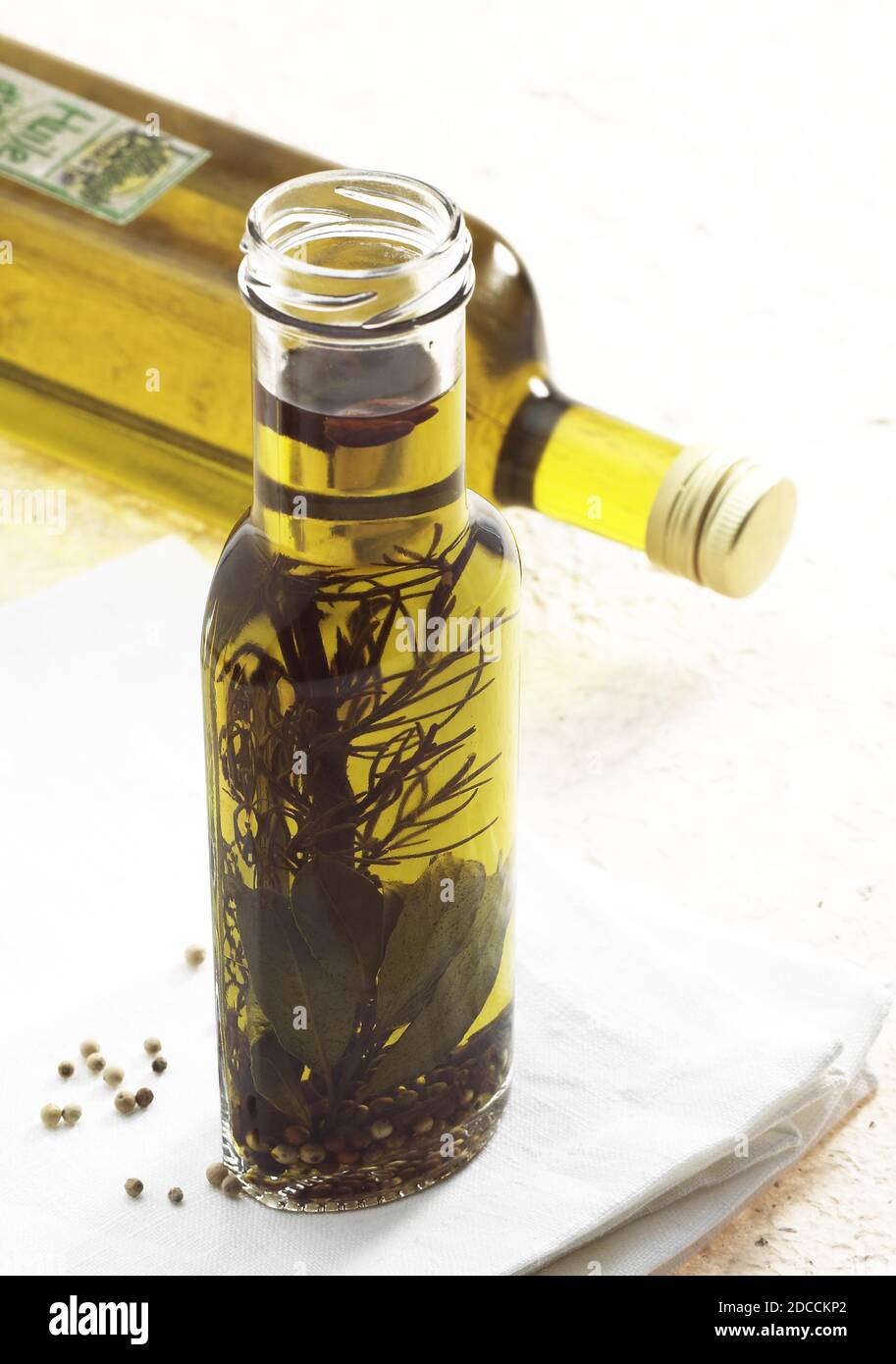 OLIVE OIL BOTTLES AGAINST WHITE BACKGROUND Stock Photo - Alamy