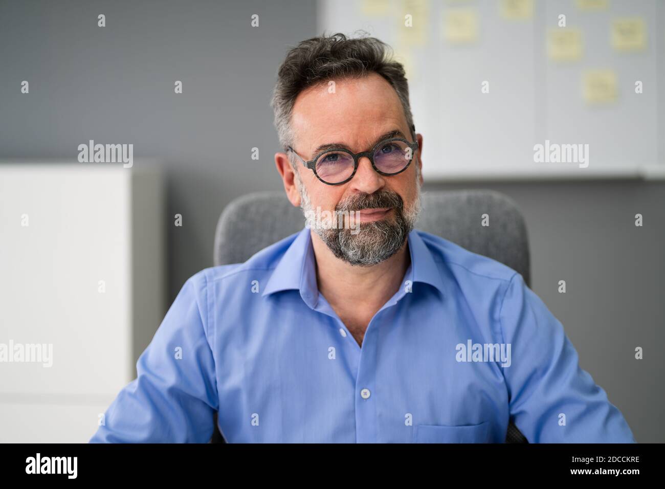 Elder Man Portrait In Video Conference Chat Stock Photo