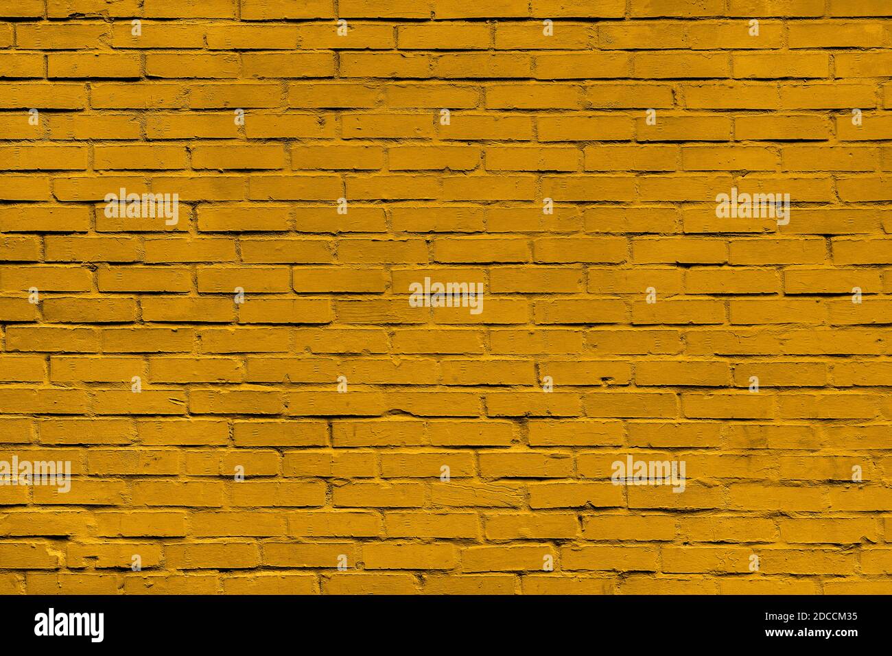 Gold brick wall hi-res stock photography and images - Alamy