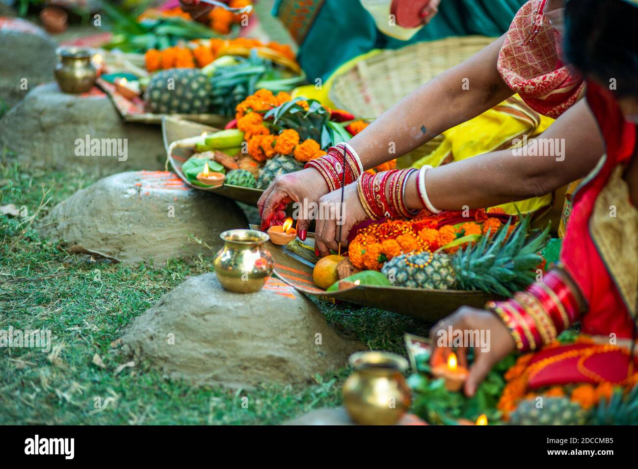 A devotee performing rituals during the celebration Stock Photo - Alamy