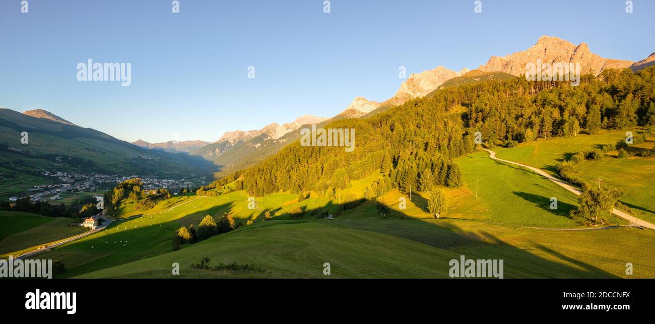 Mountains surrounding Scuol, a village in the canton of Graubünden, Switzerland. It is situated within the Lower Engadin valley along the Inn River Stock Photo