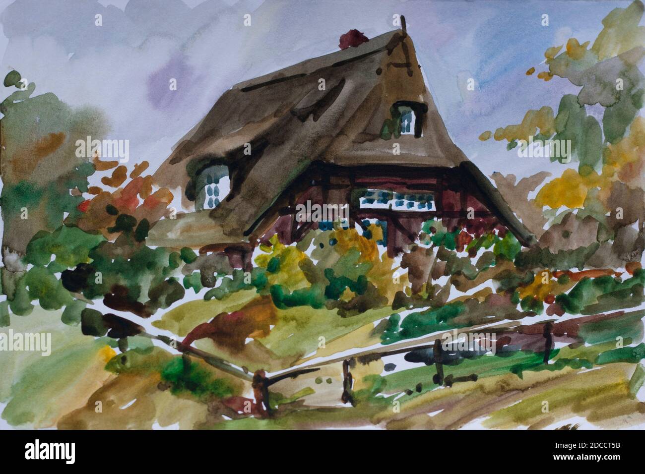 Rural landscape with old fachwerk house with straw roof and yard in autumn in Kiekeberg traditional architecture museum near Hamburg, Germany Stock Photo