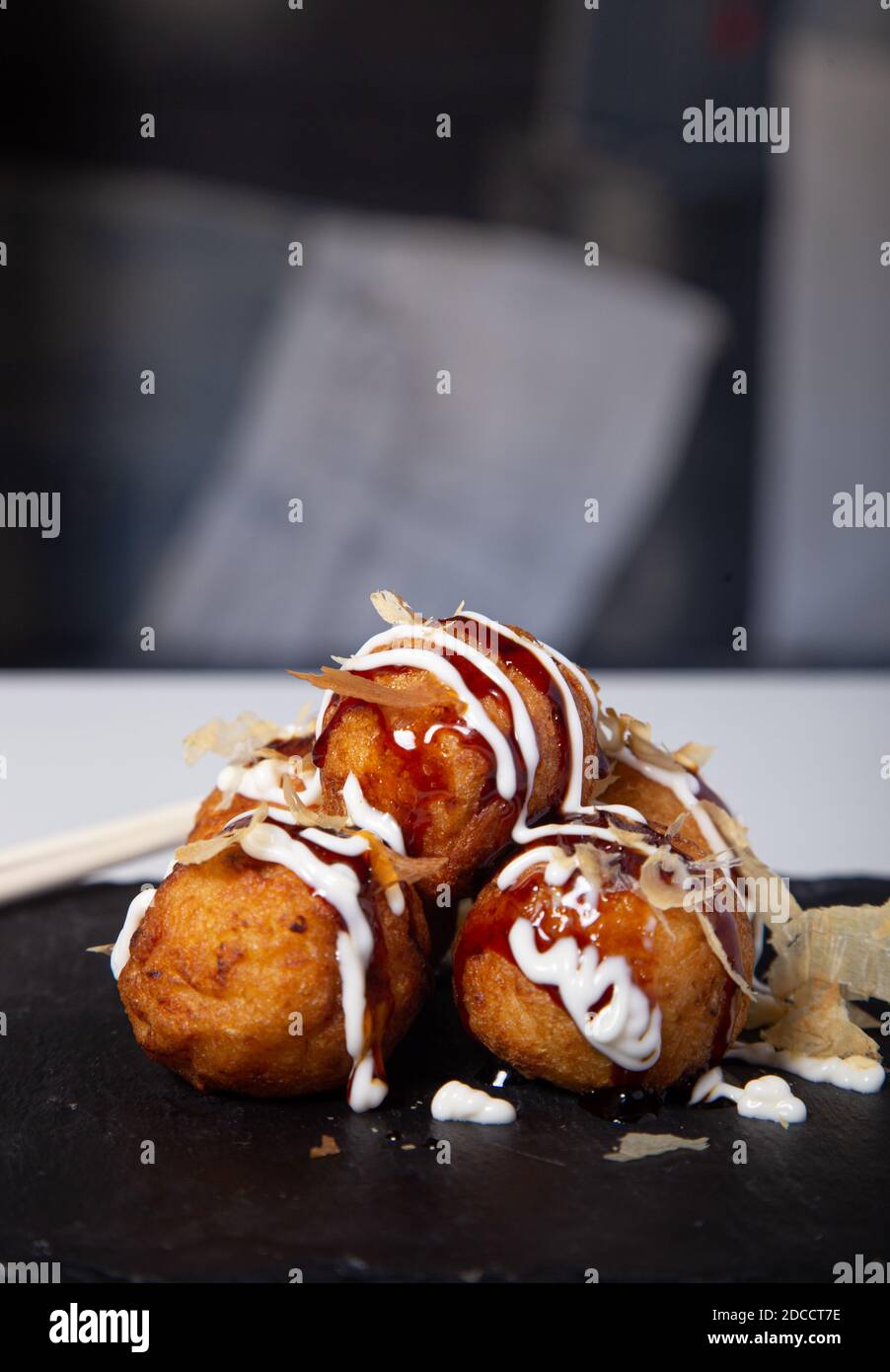 delicious japanese food octopus balls. Vertical image Stock Photo - Alamy