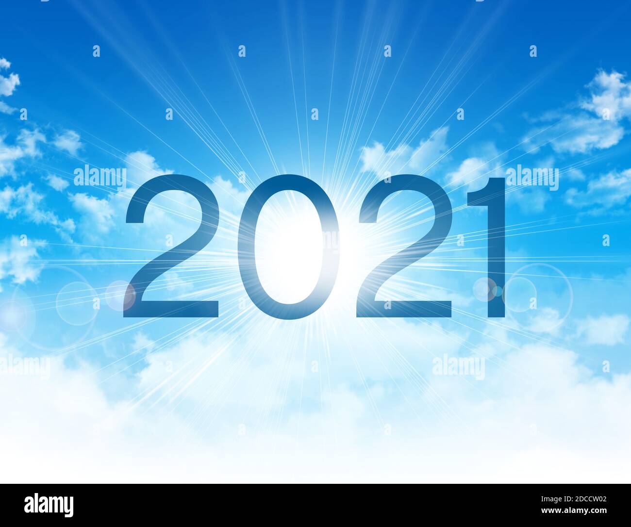 New Year 2021 date number, high in blue sky with morning sunrise, as the beginning of a new day Stock Photo