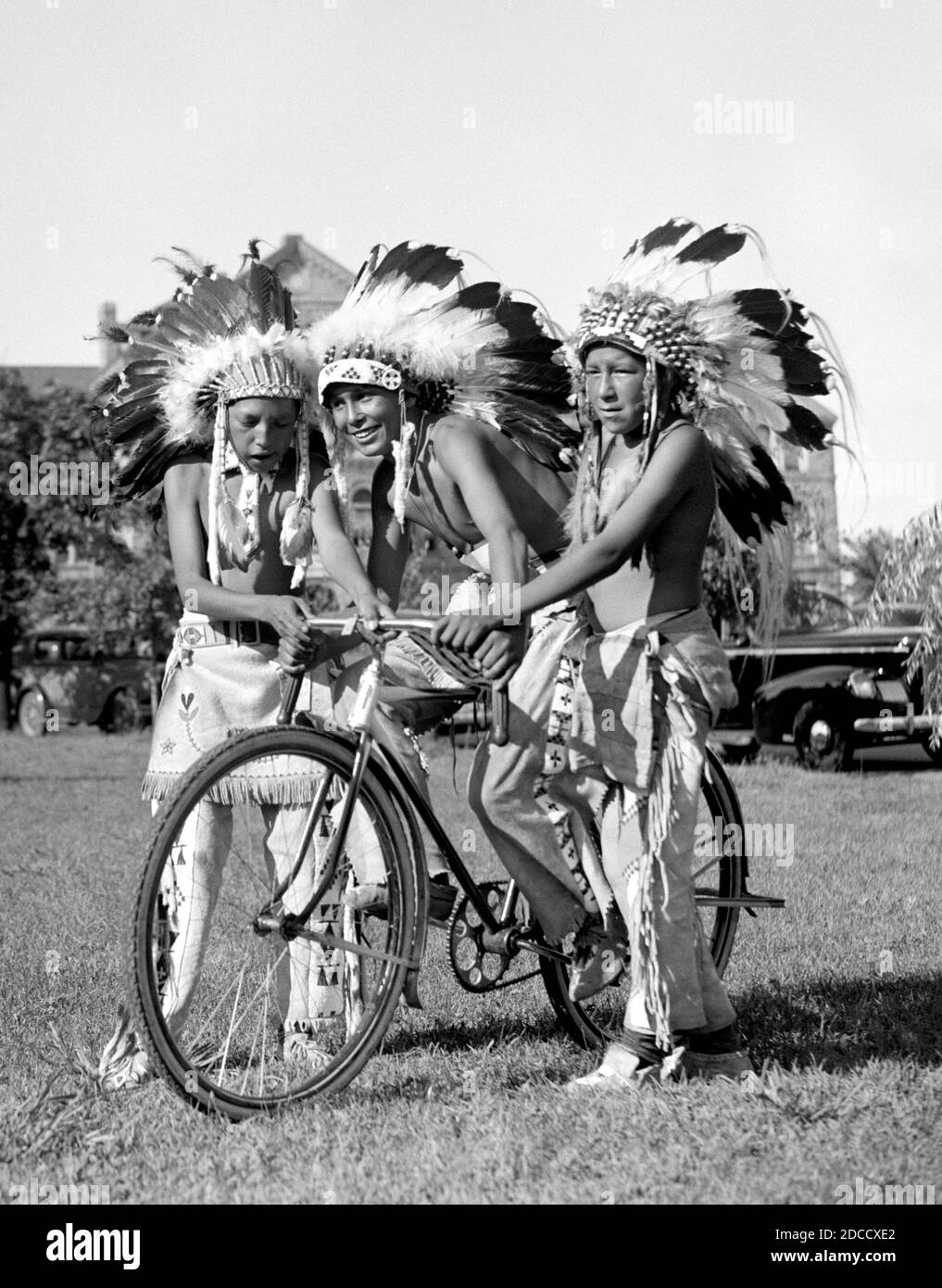 Native Americans Share Bicycle, 1938 Stock Photo - Alamy