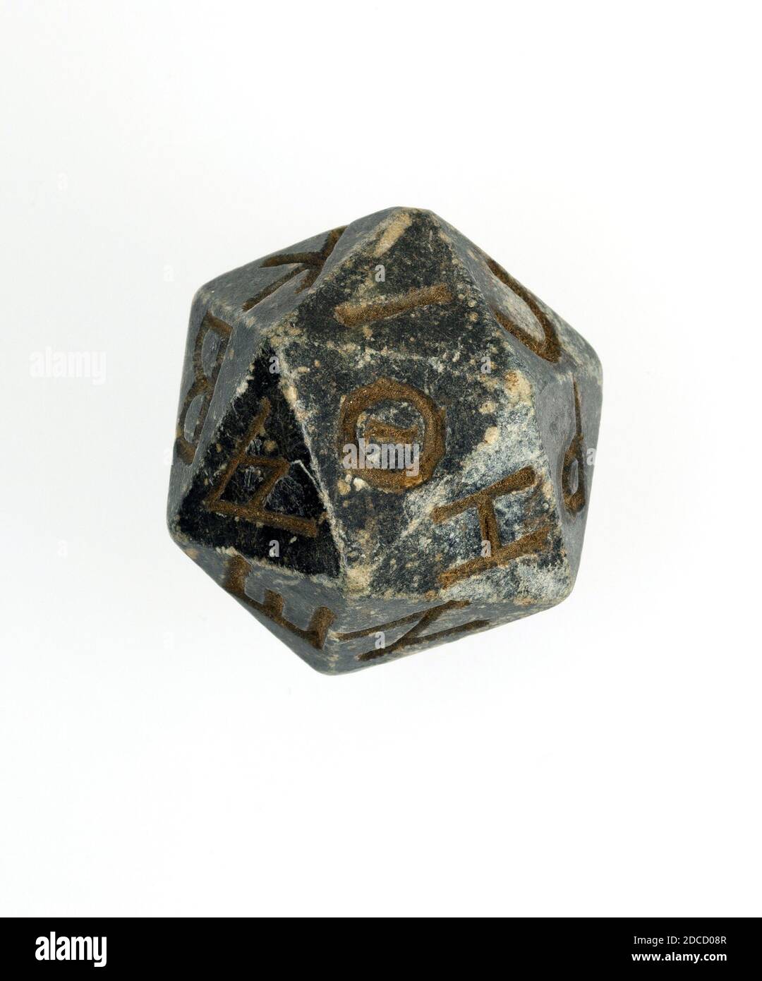 Twenty-sided Die (Icosahedron) with Greek Letters, Egyptian Stock Photo