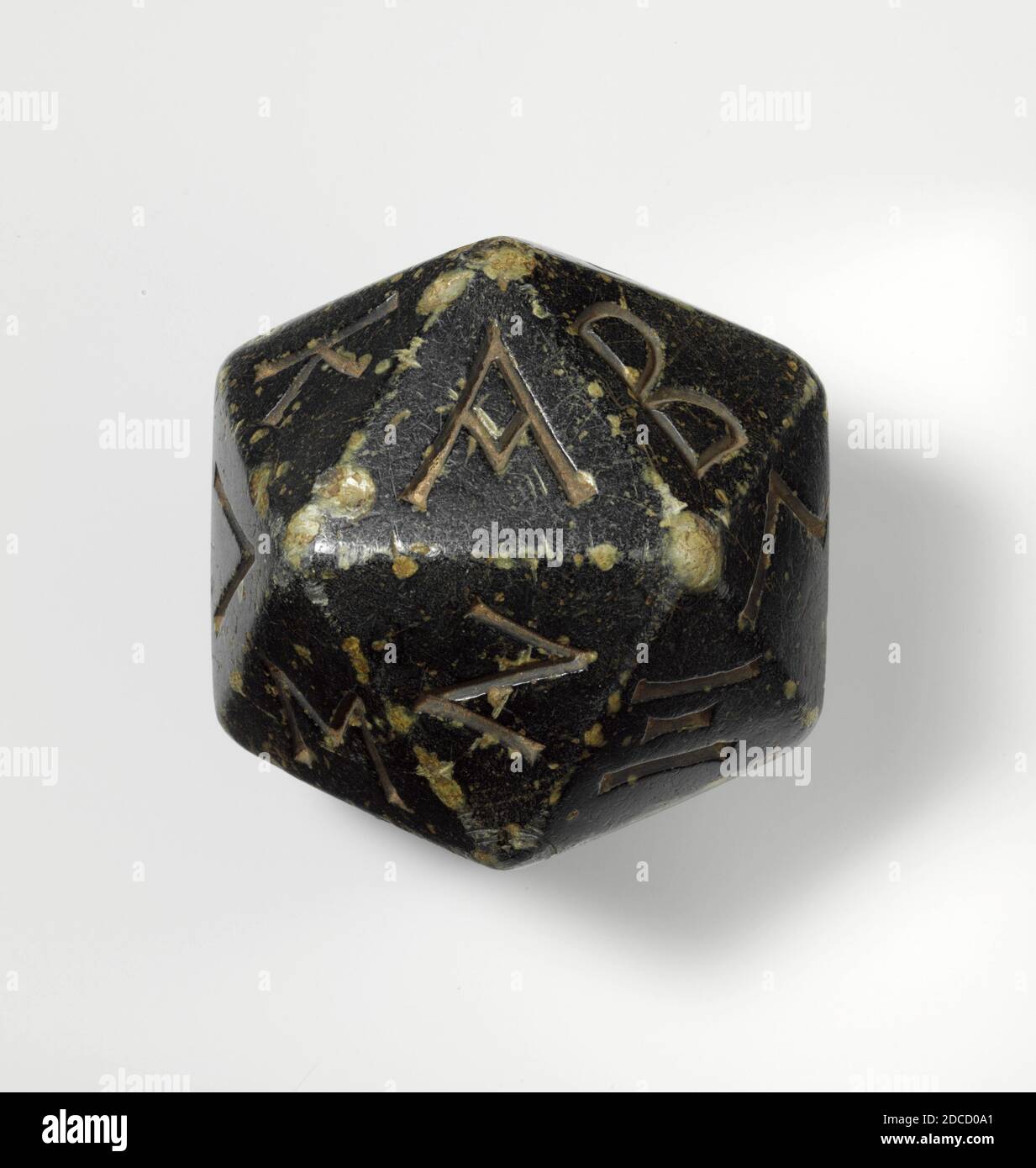 20-sided Die (Icosahedron) with Greek Alphabet Stock Photo