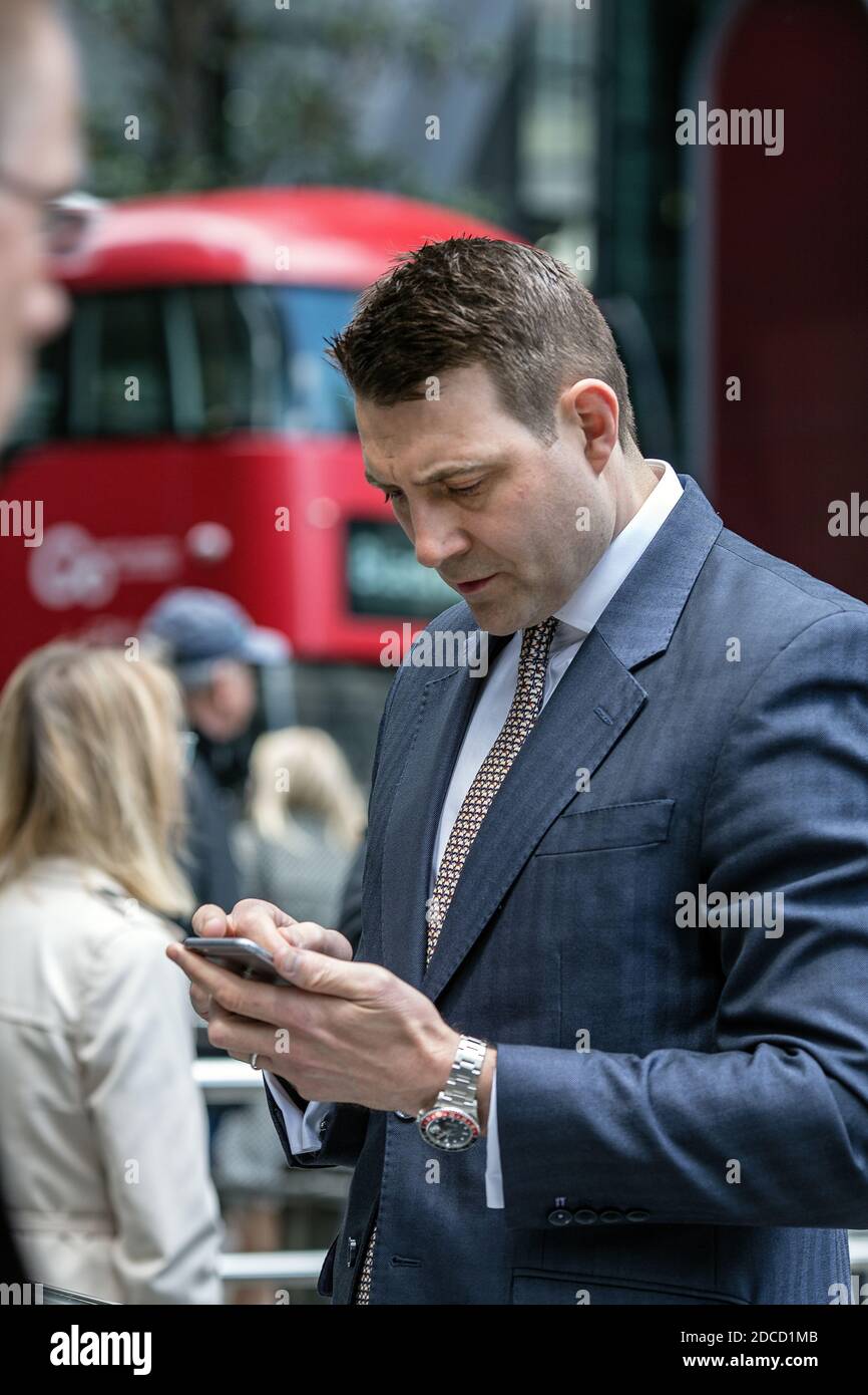 Great Britain / England /London /City of London / A City of London businessman  on his mobile phone. Stock Photo