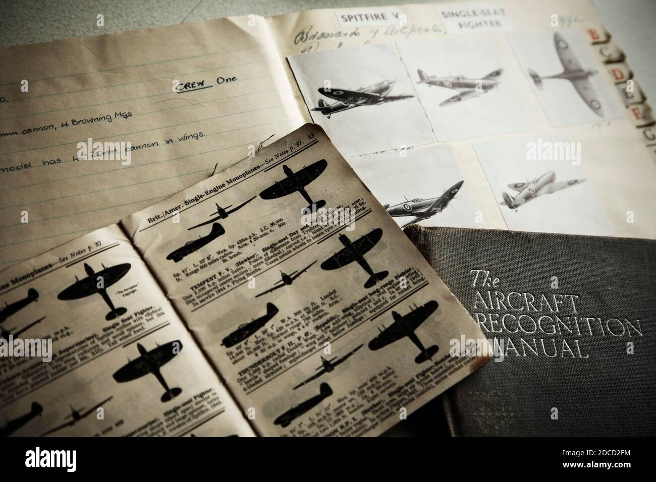 Collection of Second World War aircraft identification information, featuring the Supermarine Spitfire and Hawker Tempest fighters. Stock Photo