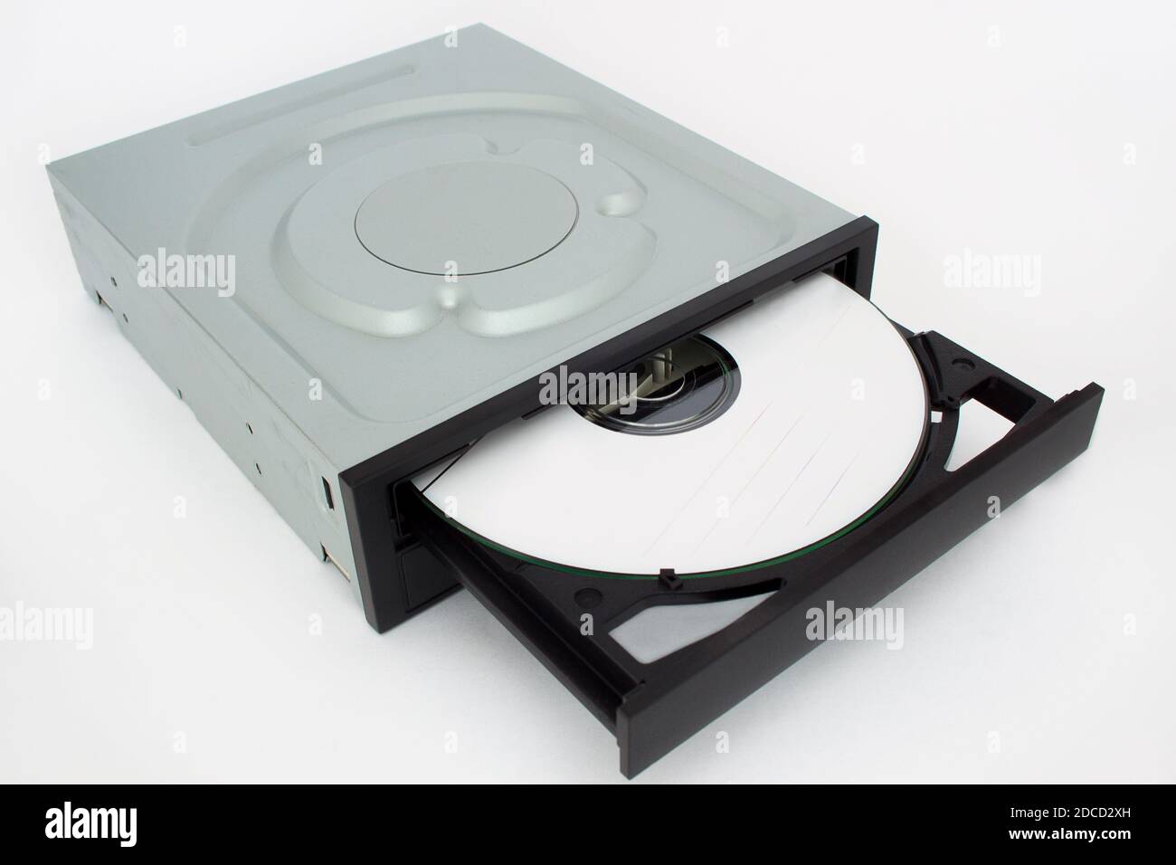 Openended CD DVD drive with a black cap and disk inside. Isolated on white background Stock
