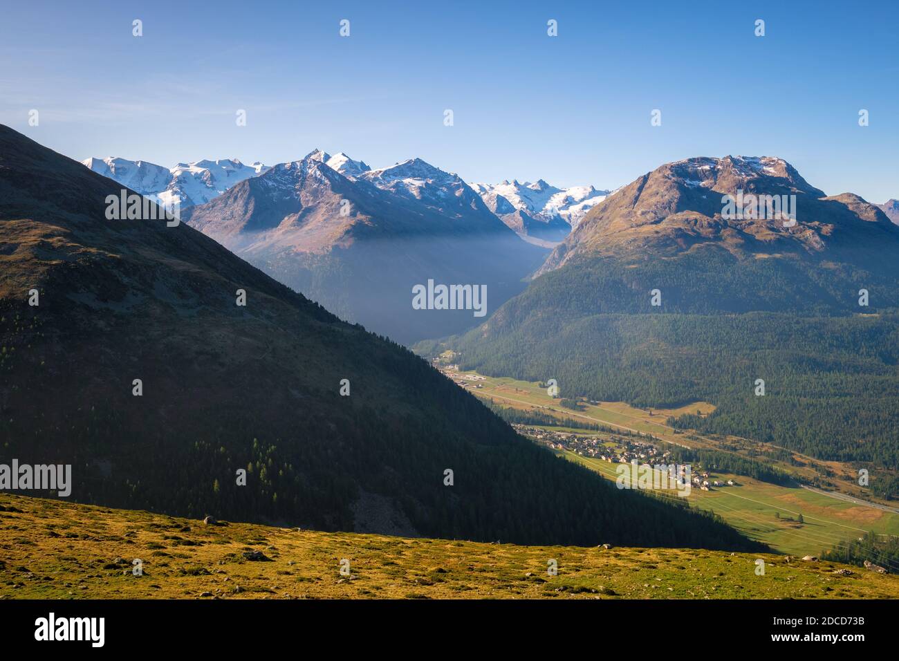 Panoramic view from Muottas Muragl (Graubünden, Switzerland) of Pontresina and Val Roseg. It is a viewpoint accessible by a funicular railway Stock Photo