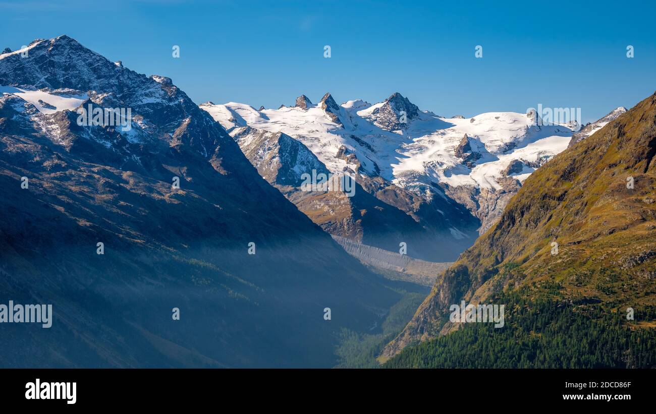 Panoramic view from Muottas Muragl (Graubünden, Switzerland) of Val Roseg. It is a viewpoint accessible by a funicular railway Stock Photo