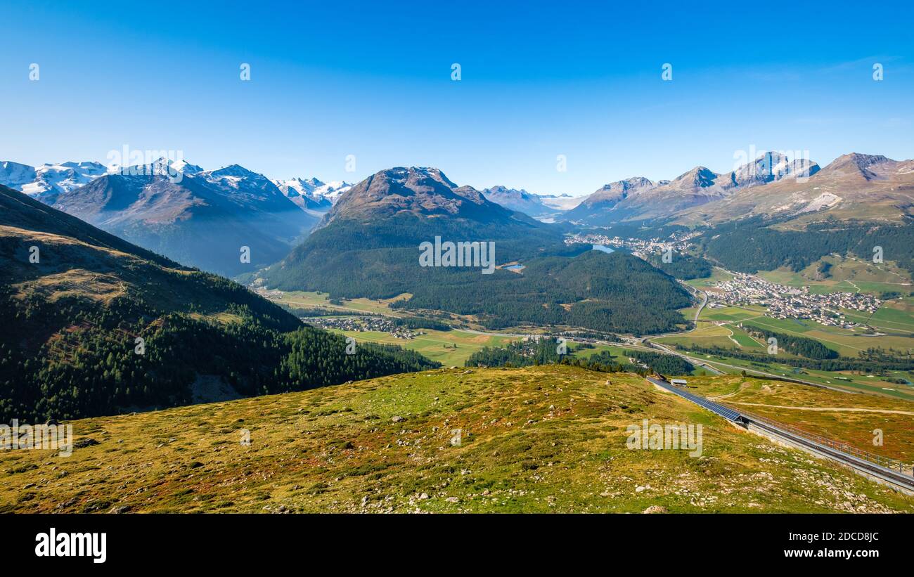 Panoramic view from Muottas Muragl (Graubünden, Switzerland) of Pontresina, Val Roseg, Celerina, the Upper Engadine Valley and the four Lakes Stock Photo