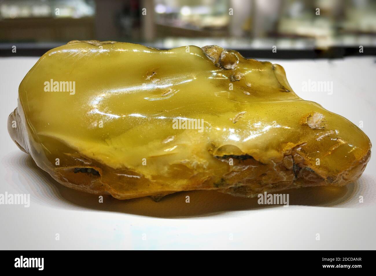 piece of natural white Baltic amber. Stock Photo
