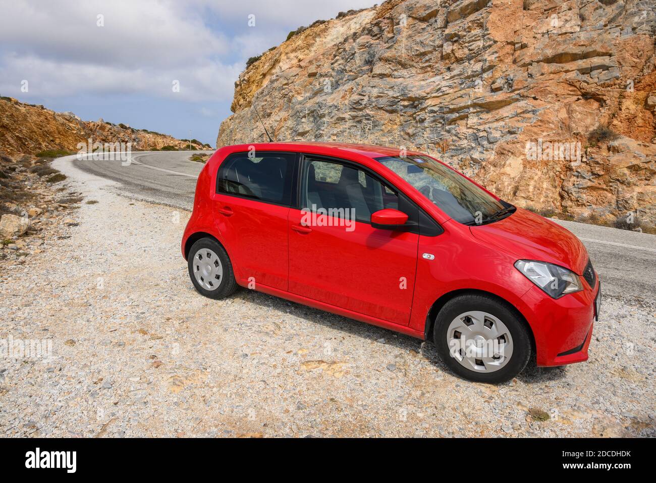 Ios, Greece - September 20, 2020: Red Seat Mii on the road in the mountainous part of Ios Island. Cyclades, Greece Stock Photo