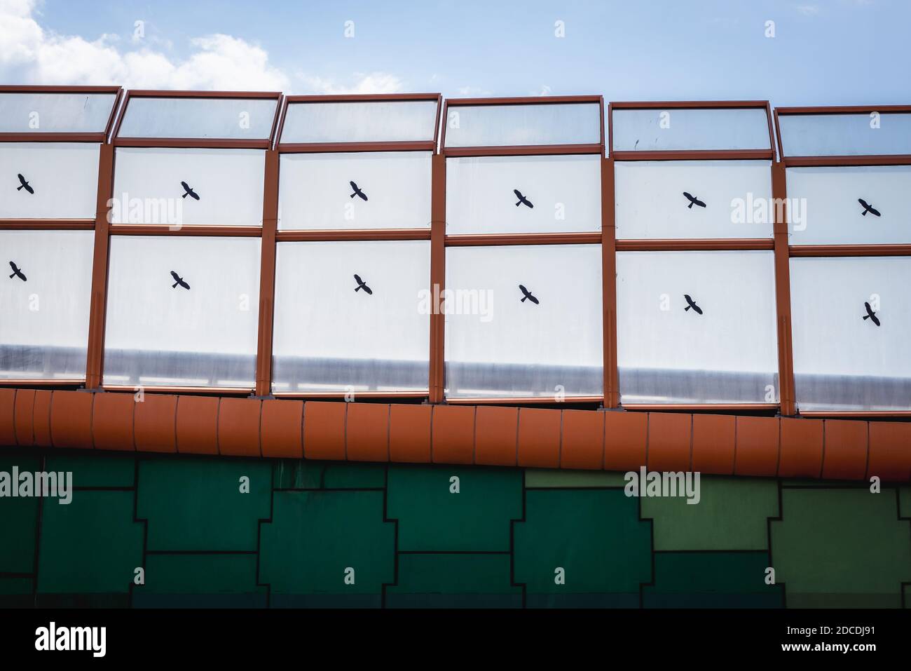 Noise barriers with birds stickers in Warsaw city, Poland Stock Photo