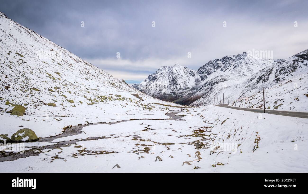 Snow has fallen during late Summer, early Fall at the Flüela Pass (Switzerland). It is a high mountain pass in the Swiss Alps in Graubünden Stock Photo
