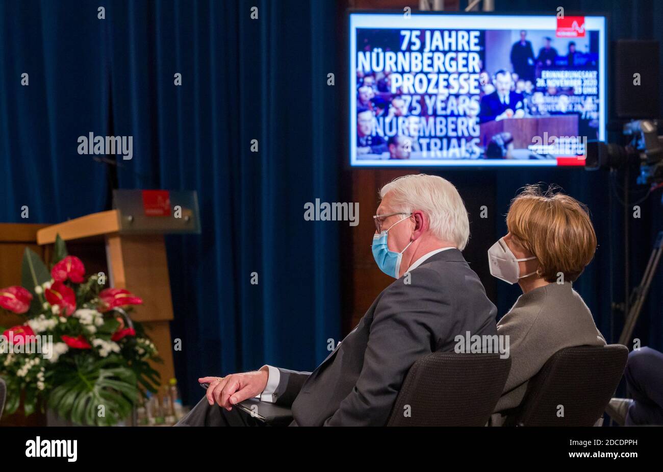Nuremberg, Germany. 20th Nov, 2020. Federal President Frank-Walter Steinmeier and his wife Elke Büdenbender are following a panel discussion during the ceremony marking the 75th anniversary of the start of the Nuremberg war crimes trials in Room 600 of the Nuremberg Palace of Justice. Credit: Daniel Karmann/dpa-Pool/dpa/Alamy Live News Stock Photo