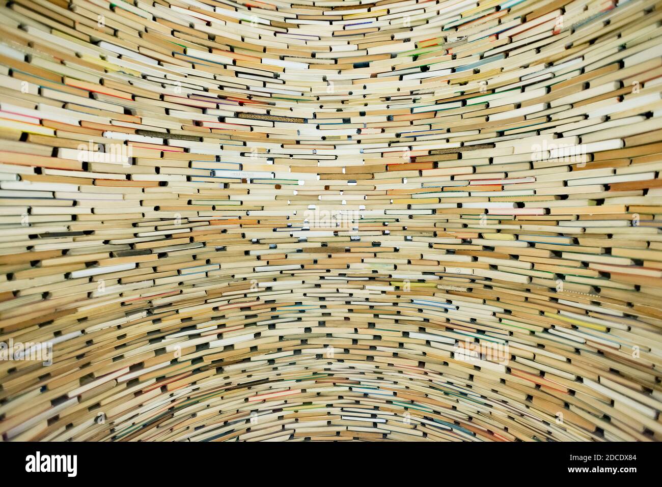 Wall of books. Well made from books. Stack of books. Stock Photo