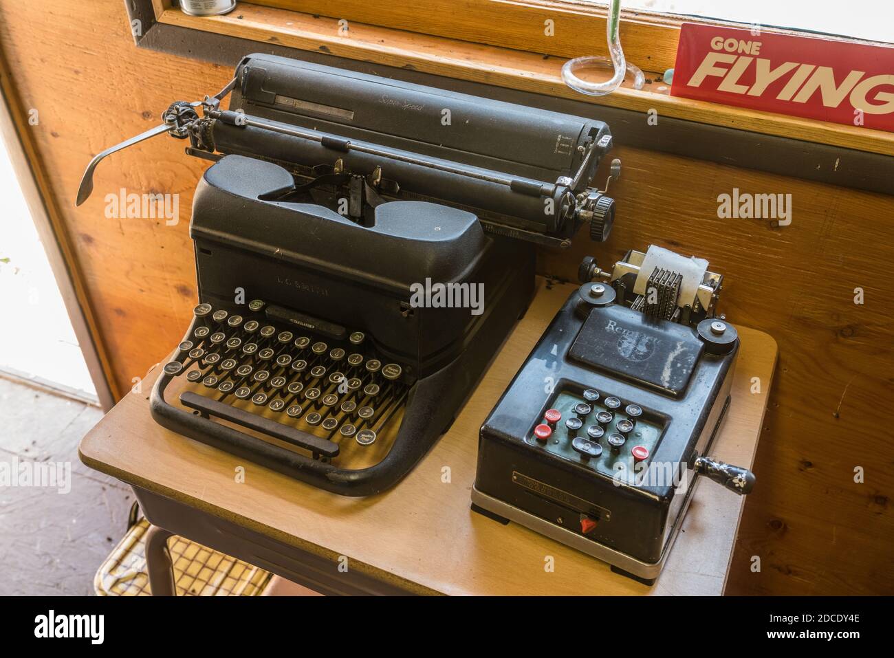 Vintage office equipment, including a typewriter and an adding machine