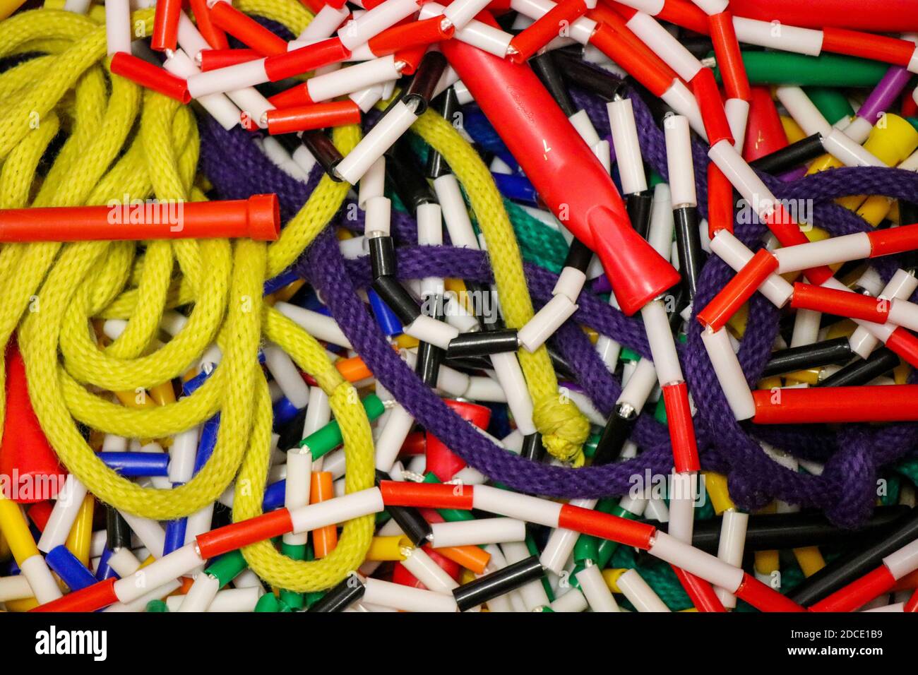 Colorful jump ropes in the school gym storage room Stock Photo Alamy