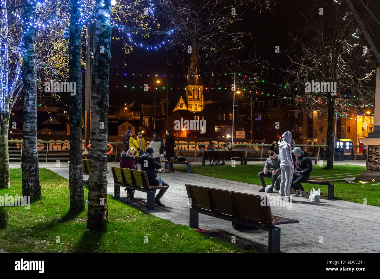 Cork, Ireland. 20th Nov, 2020. Cork city centre is busy with revellers tonight, gathering outside off-licences, takeaway shops and in the street. This comes after Gardaí dispersed many groups of people in Cork and Dublin last weekend. Credit: AG News/Alamy Live News Stock Photo