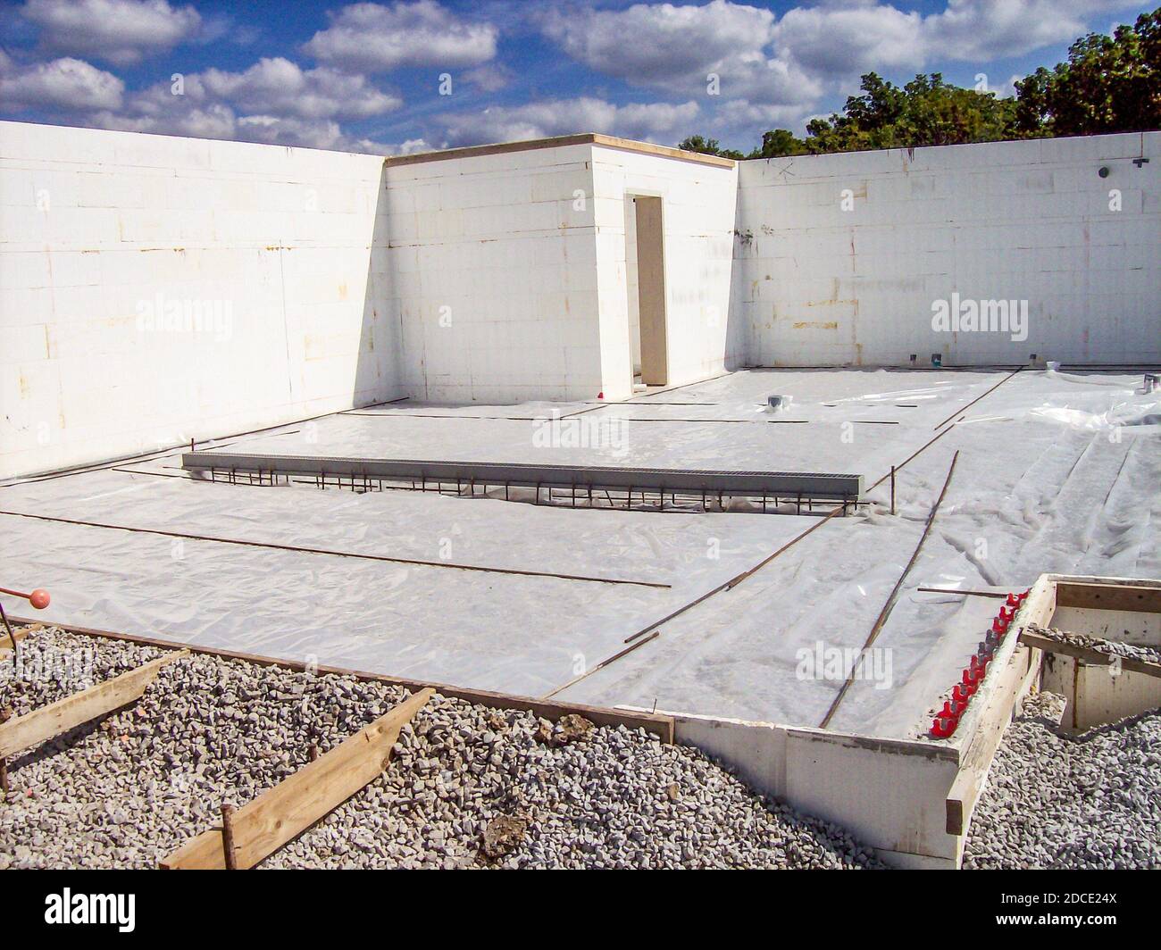 Construction site with planned out stubs, forms, and tools Stock Photo