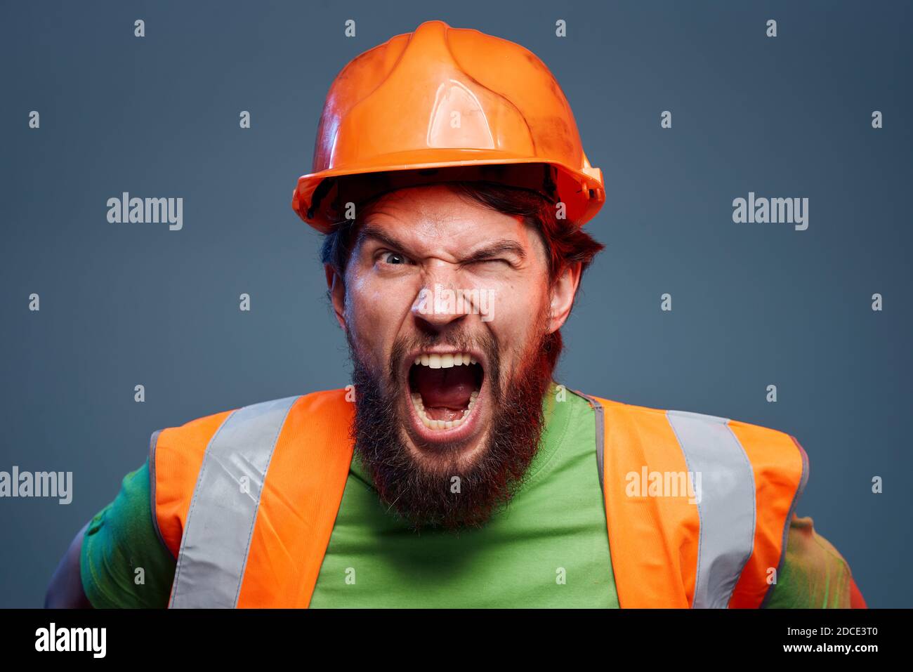 emotional man worker orange paint hard work Stock Photo Alamy
