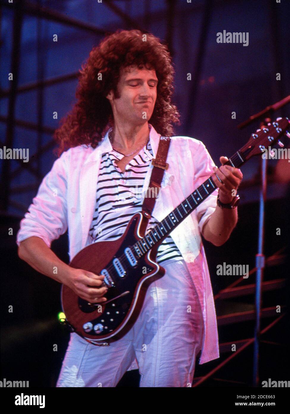The British rock band Queen in concert at the Råsunda Football Stadium,Stockholm,Sweden 7th June 1986: Brian May Stock Photo