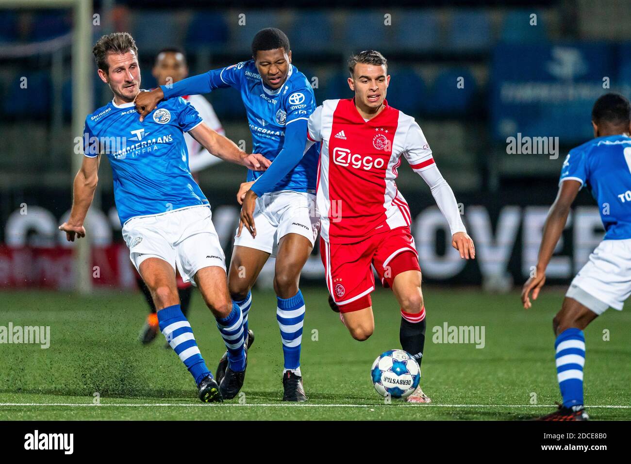 DEN BOSCH, Netherlands. 20th Nov, 2020. football, Dutch Jupiler league,  season 2020/2021, FC Den Bosch player Paco van Moorsel (L), FC Den Bosch  player Stan Maas (M), Jong Ajax player Enric Llansana (