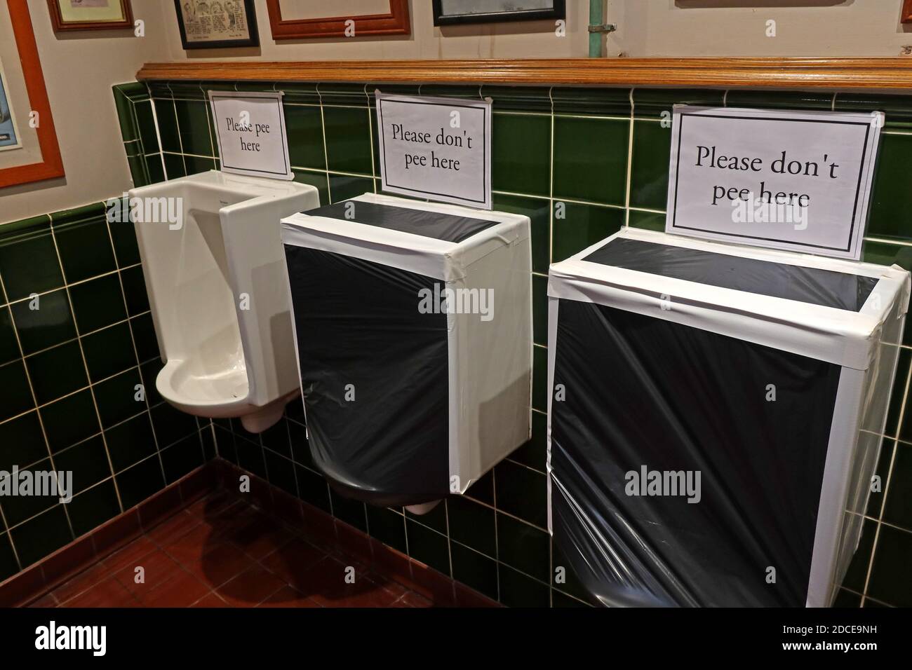 Please Pee Here,Please Dont Pee Here,Little Manor pub,Covid19 restrictions,Thelwall ,Warrington,Cheshire,England,UK Stock Photo
