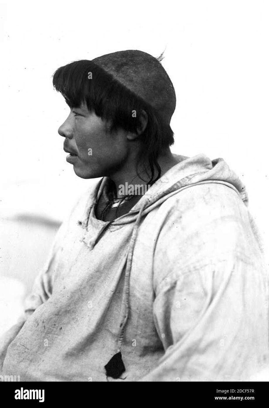 King Island Eskimo man wearing a skullcap and parka, King Island