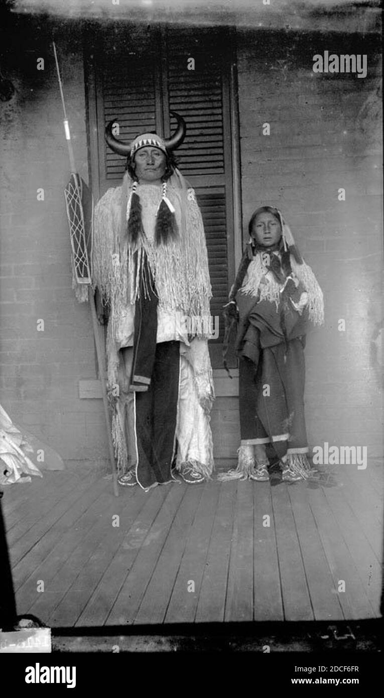 Kiowa Indians - Ongotoya (Solitary Traveler) and Son. Stock Photo