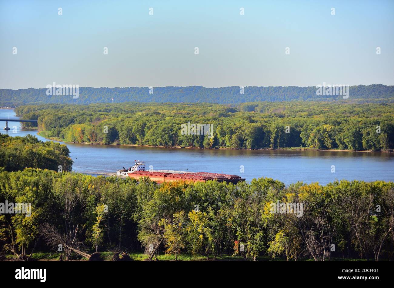 Tugboat pushing six barges in the Mississippi River