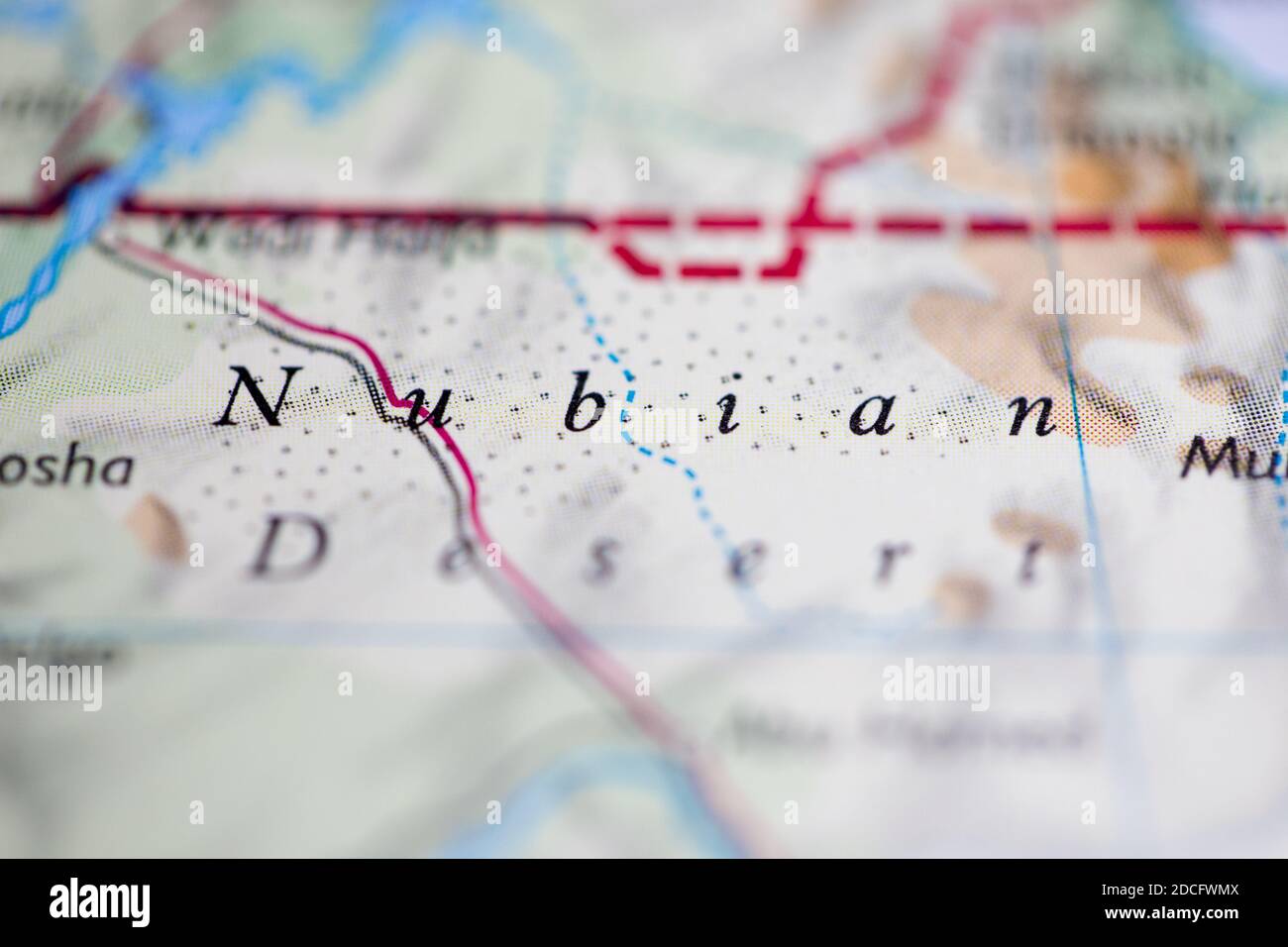 Shallow depth of field focus on geographical map location of Nubian Desert Sudan Africa continent on atlas Stock Photo