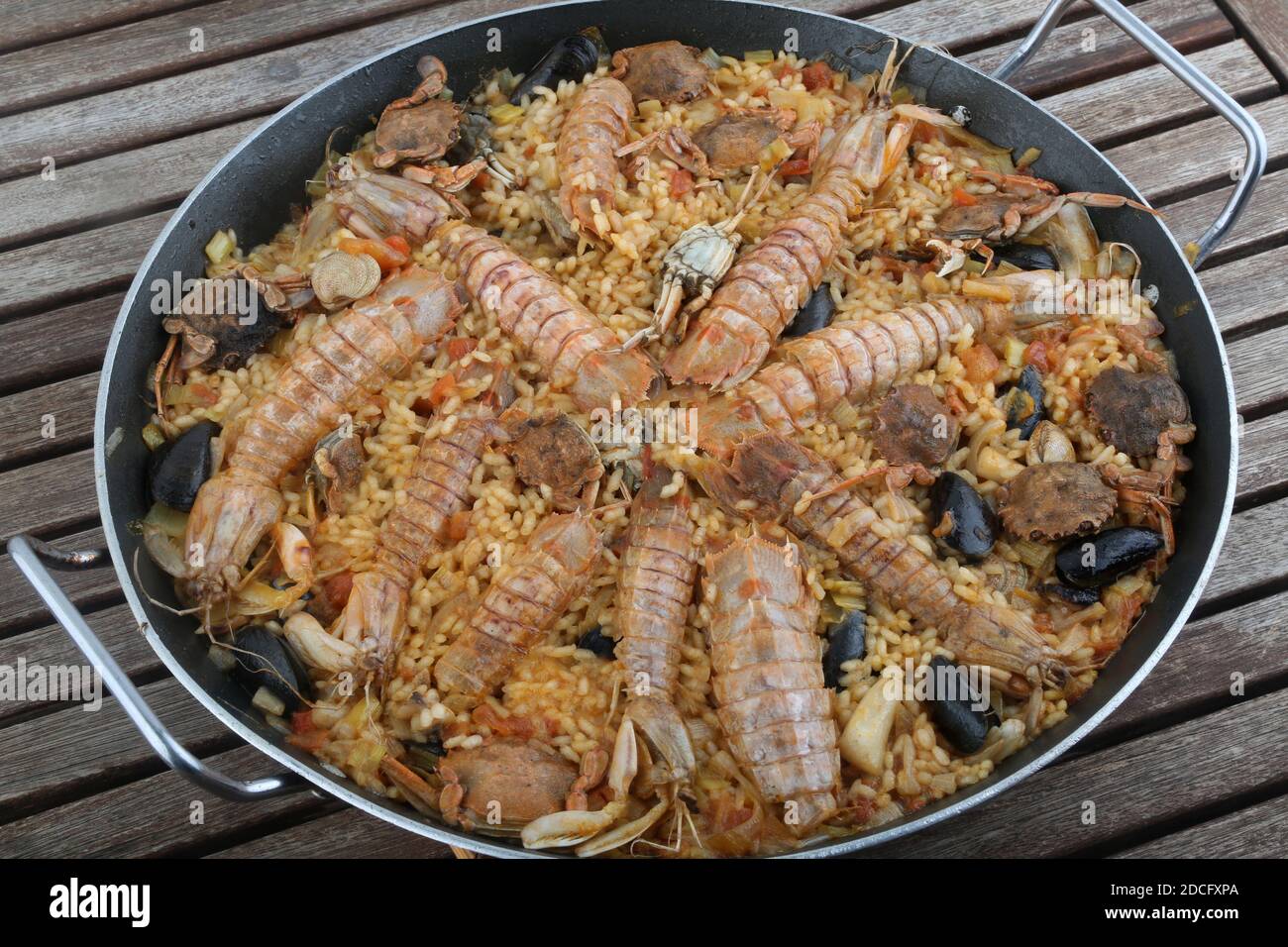 seafood rice with crayfish calamari and mussels typical spain Stock Photo