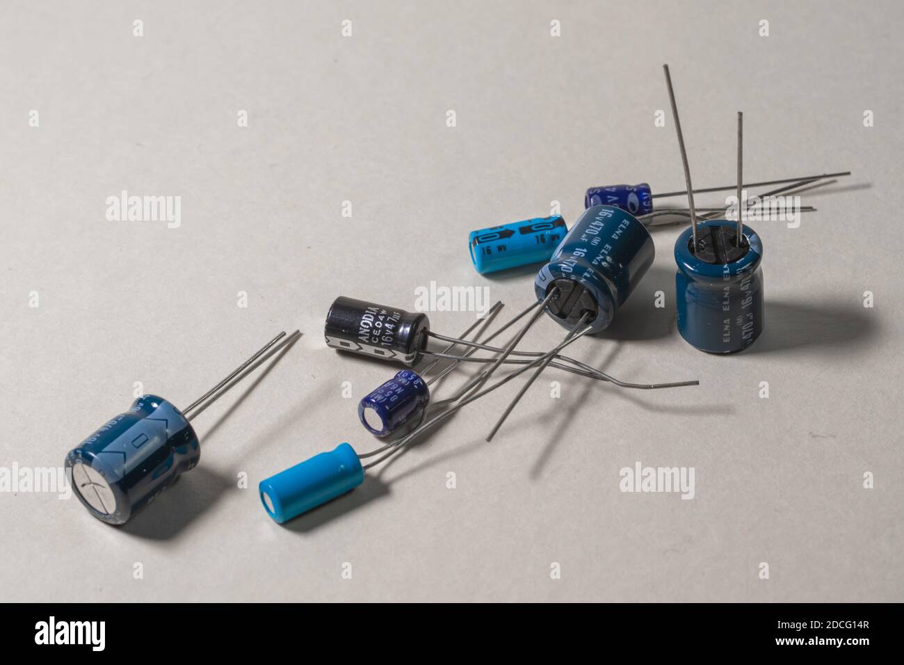 electronic components scattered on clear background Stock Photo